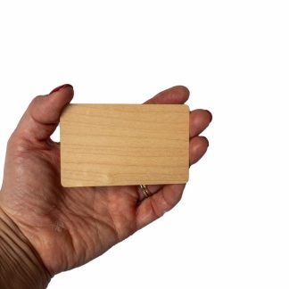Maple wooden NFC card for a digital memorial on a white background.