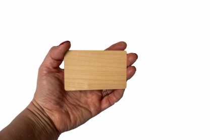 Maple wooden NFC card for a digital memorial on a white background.