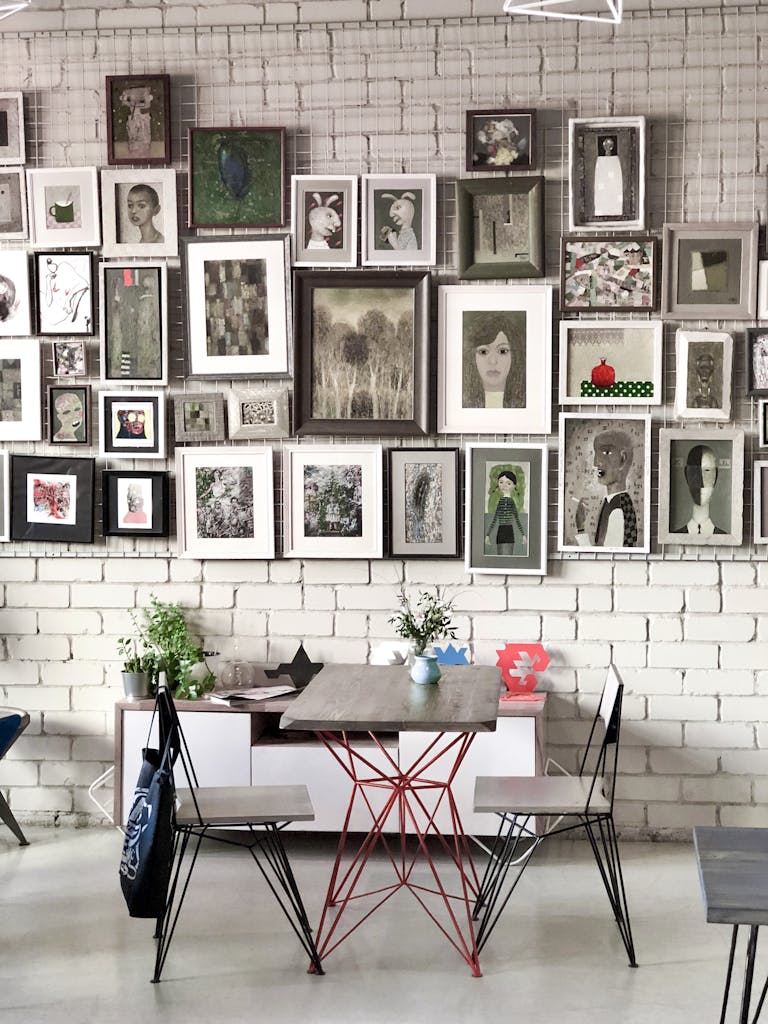 Modern art gallery interior featuring unique furniture and creative wall frames.